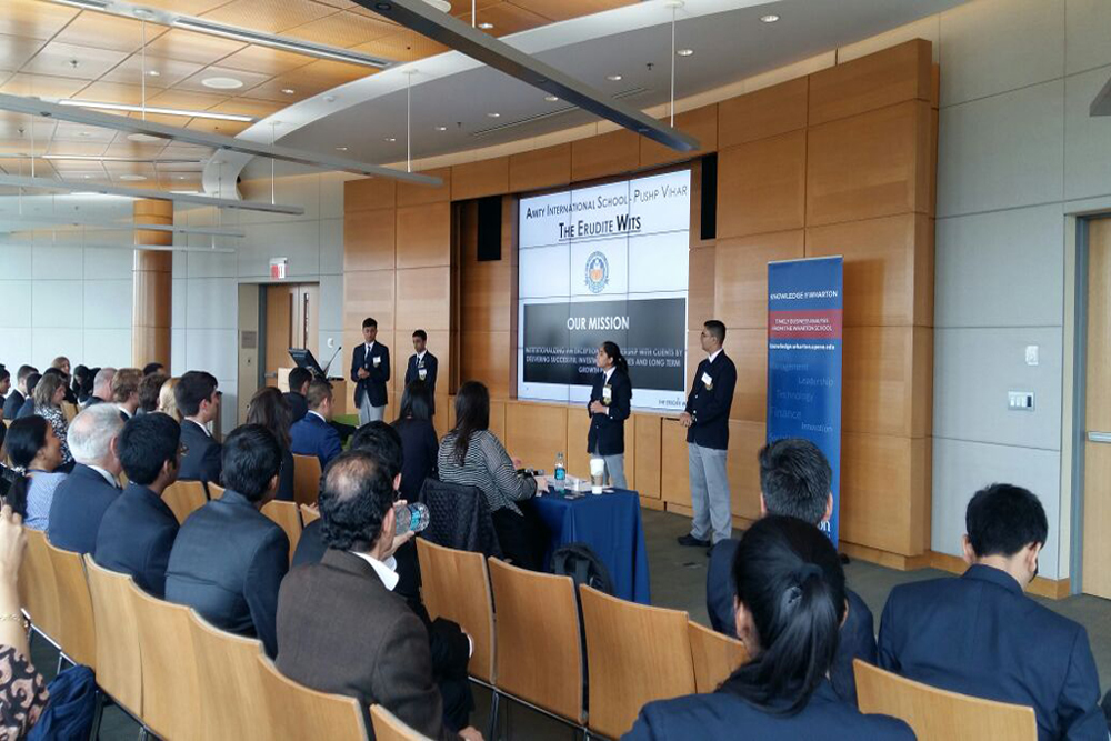 students giving a presentation inWharton Investment Competition