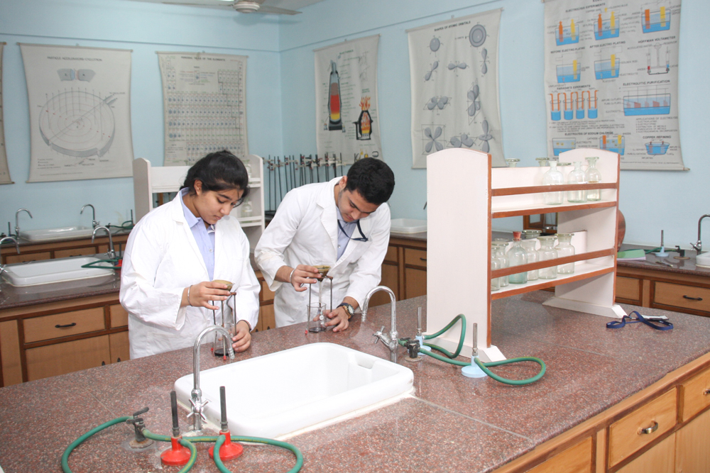 Students conducting experiments in the chemistry lab